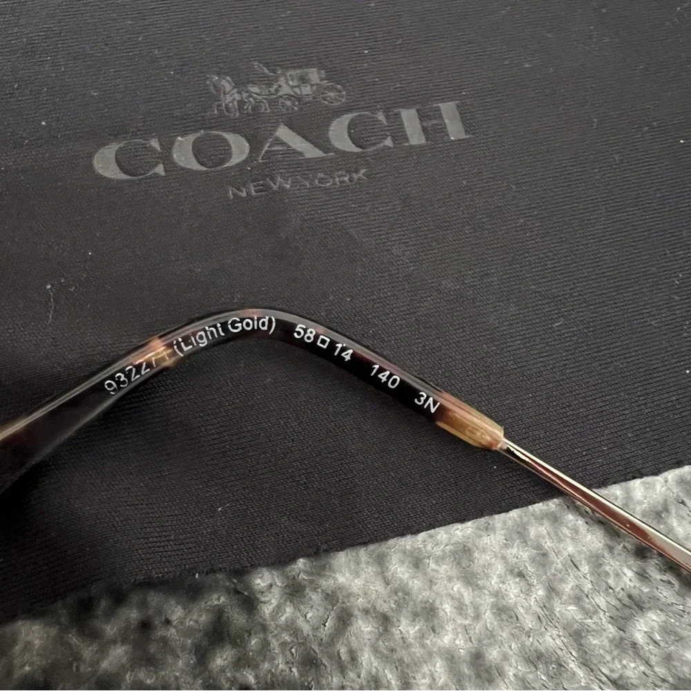 Coach aviator gold